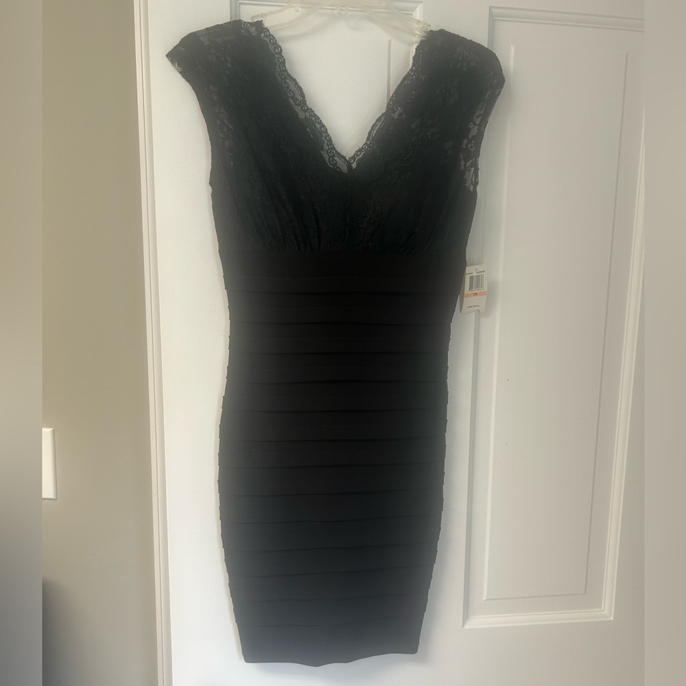 Short, black, B. Darlin dress.